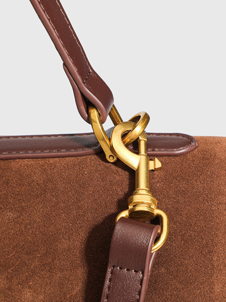 Gold-toned suede handbag